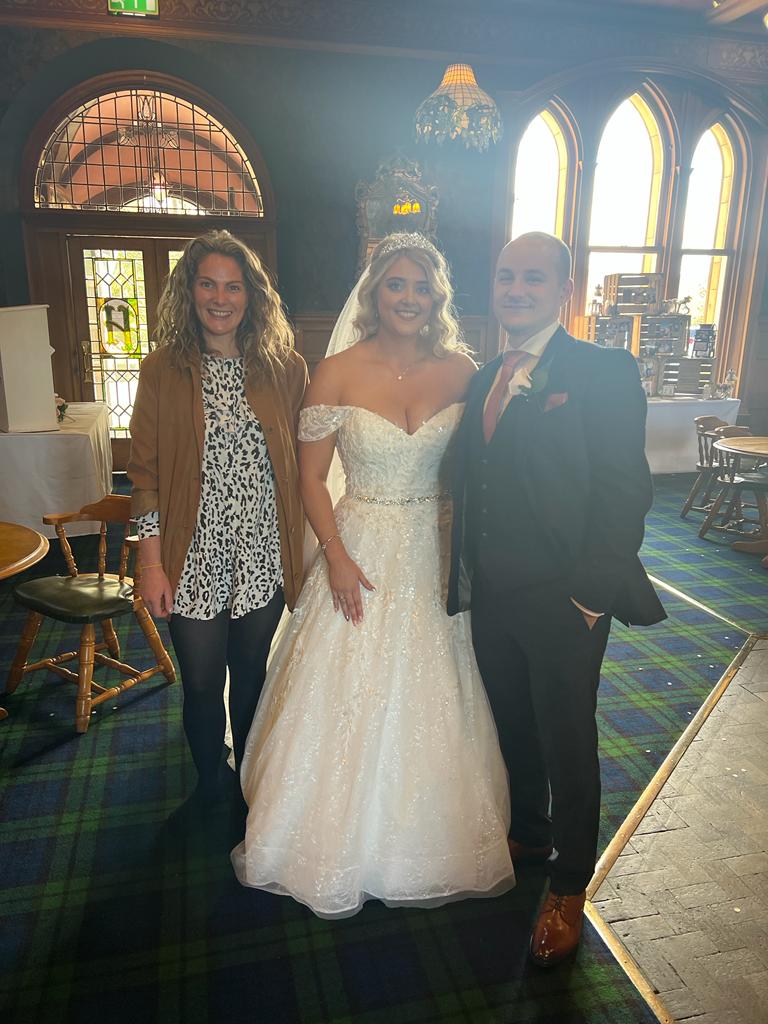 Wedding singer Melody with bride Gemma and groom Callum at Rushpool Hall 